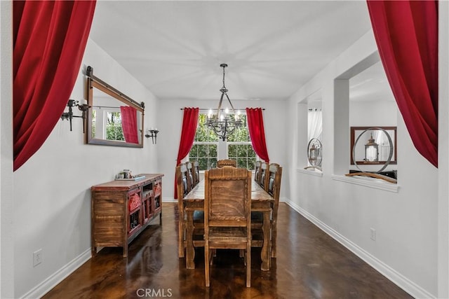 29259 Black Pine Way, Saugus, CA 91390 - dining space featuring baseboards, finished concrete flooring, and a chandelier