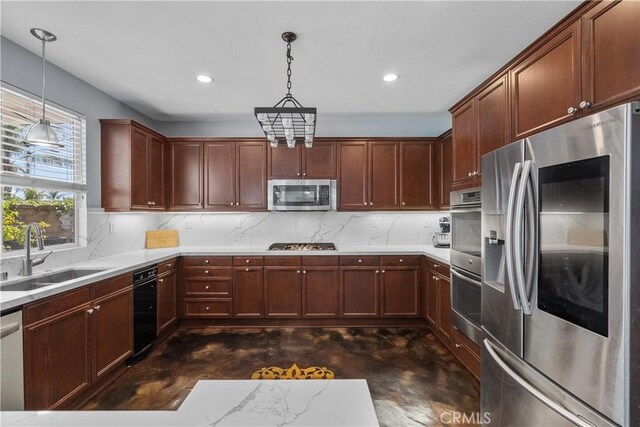 29259 Black Pine Way, Saugus, CA 91390 - kitchen featuring stainless steel appliances, a sink, decorative backsplash, concrete floors, and recessed lighting