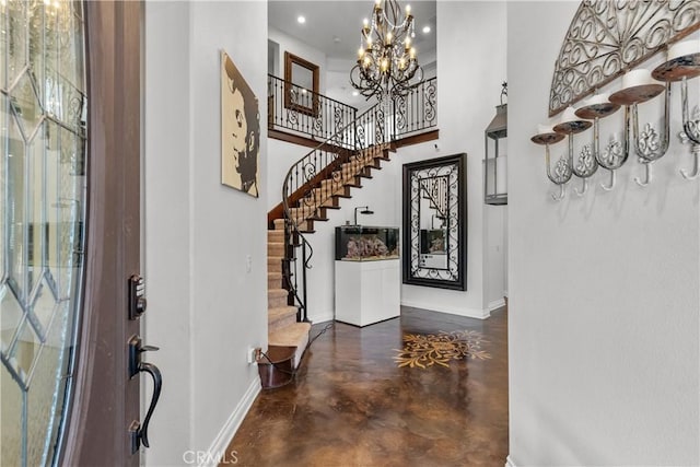 29259 Black Pine Way, Saugus, CA 91390 - foyer entrance with baseboards, finished concrete flooring, a chandelier, stairway, and recessed lighting