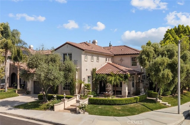 29259 Black Pine Way, Saugus, CA 91390 - mediterranean / spanish house featuring concrete driveway, stucco siding, a tile roof, an attached garage, and a chimney