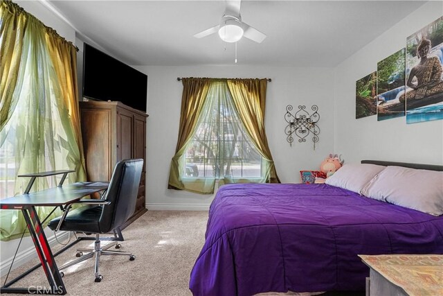 29259 Black Pine Way, Saugus, CA 91390 - bedroom featuring light carpet, an office area, a ceiling fan, and baseboards