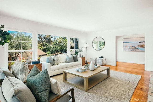 27317 Sunnyridge Rd, Palos Verdes Peninsula, CA 90274 - living room featuring healthy amount of natural light, baseboards, wood finished floors, and ornamental molding
