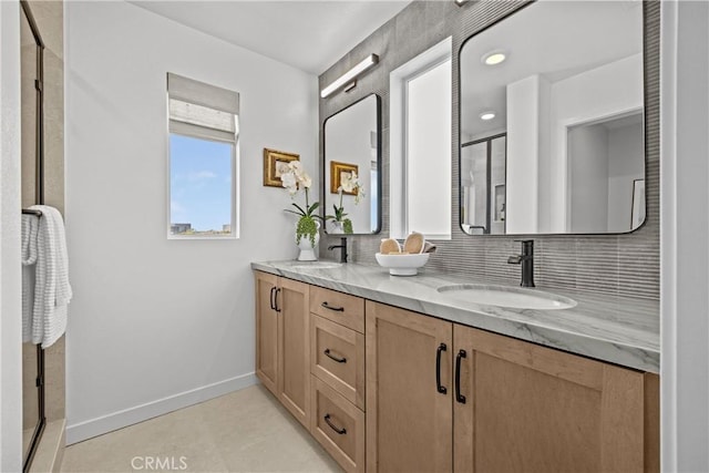 22304 Sage Ct, Torrance, CA 90502 - full bathroom with double vanity, a shower stall, and tasteful backsplash