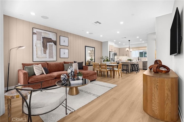 22304 Sage Ct, Torrance, CA 90502 - living area featuring light wood-style flooring and recessed lighting
