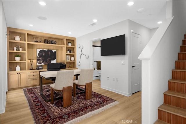 22304 Sage Ct, Torrance, CA 90502 - dining area featuring stairway, light wood finished floors, recessed lighting, an office area, and a baseboard radiator
