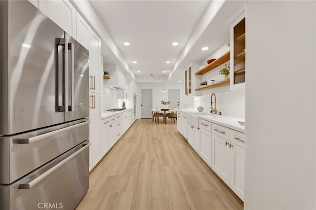 23043 Park Este, Calabasas, CA 91302 - kitchen featuring freestanding refrigerator, open shelves, white cabinets, light wood finished floors, and recessed lighting