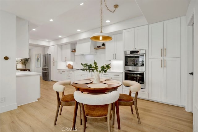 23043 Park Este, Calabasas, CA 91302 - dining space with light wood-type flooring and recessed lighting