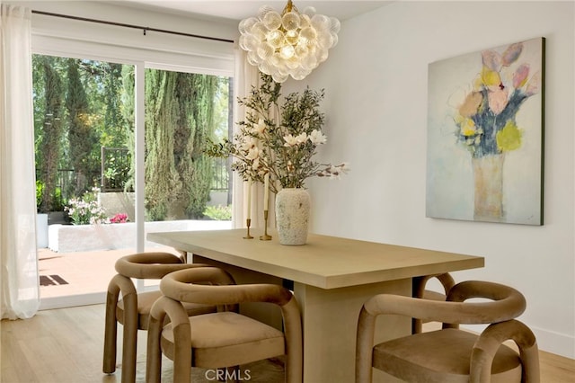 23043 Park Este, Calabasas, CA 91302 - dining room featuring a chandelier and light wood finished floors