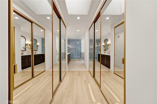 23043 Park Este, Calabasas, CA 91302 - hallway with light wood-style floors and recessed lighting