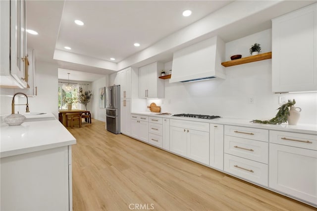 23043 Park Este, Calabasas, CA 91302 - kitchen featuring open shelves, freestanding refrigerator, gas stovetop, white cabinetry, and recessed lighting