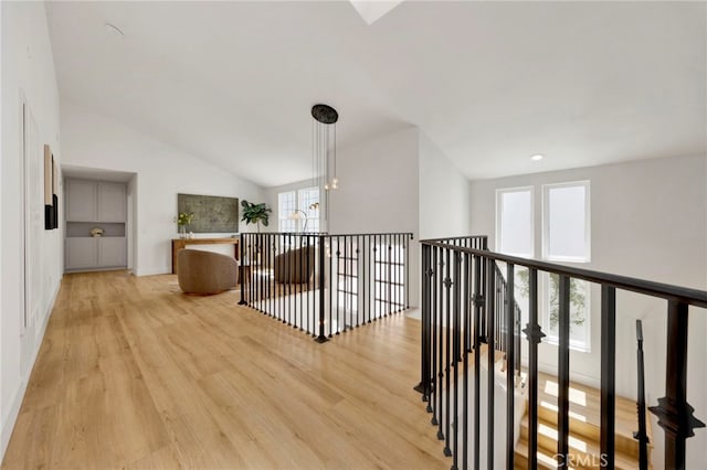 23043 Park Este, Calabasas, CA 91302 - corridor featuring light wood-style floors and vaulted ceiling