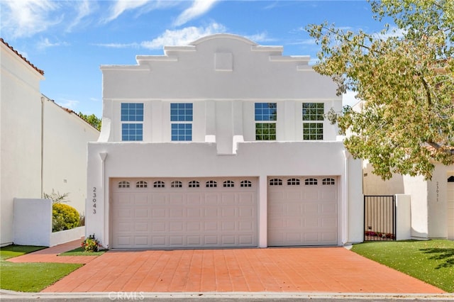 23043 Park Este, Calabasas, CA 91302 - view of front of home featuring stucco siding and a garage