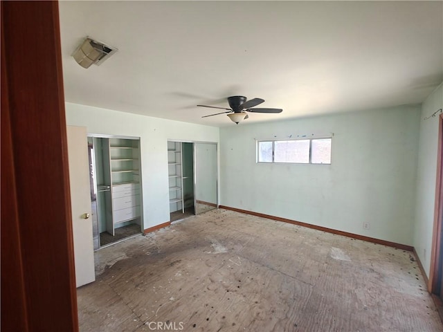 925 W Autumn Dr, Anaheim, CA 92805 - unfurnished bedroom with two closets, a ceiling fan, and baseboards