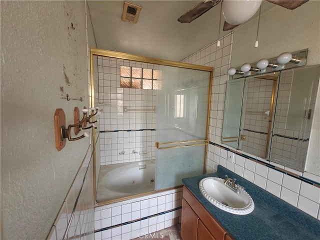 925 W Autumn Dr, Anaheim, CA 92805 - full bath featuring vanity, a combined bath / shower with jetted tub, tasteful backsplash, and a ceiling fan