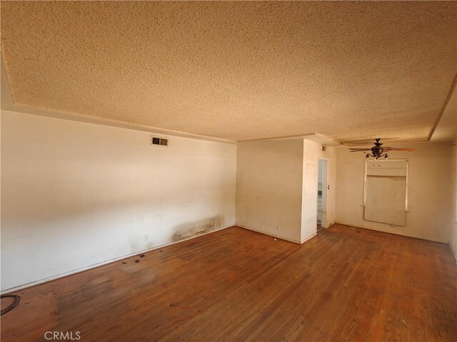 925 W Autumn Dr, Anaheim, CA 92805 - empty room with a textured ceiling, wood finished floors, and a ceiling fan