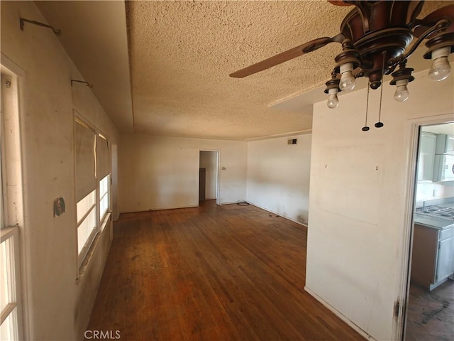 925 W Autumn Dr, Anaheim, CA 92805 - empty room with a textured ceiling, ceiling fan, wood finished floors, and washer / clothes dryer
