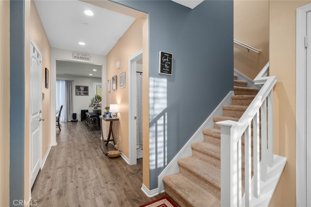 14226 Bonavento Ln, Beaumont, CA 92223 - foyer with wood finished floors, stairs, recessed lighting, and baseboards