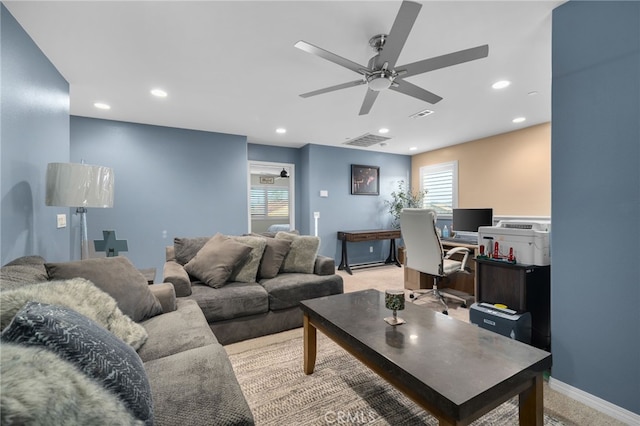 14226 Bonavento Ln, Beaumont, CA 92223 - living room featuring ceiling fan, a desk, recessed lighting, light colored carpet, and baseboards
