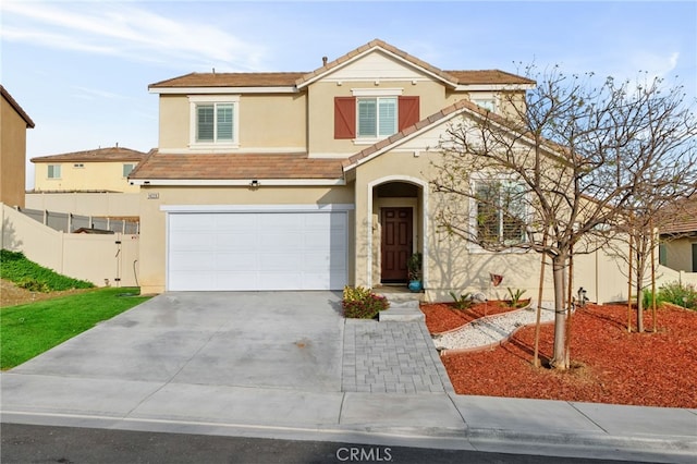 14226 Bonavento Ln, Beaumont, CA 92223 - view of front of house featuring stucco siding, concrete driveway, and a garage