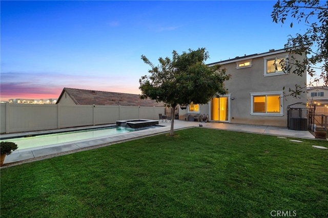 14226 Bonavento Ln, Beaumont, CA 92223 - back of property featuring stucco siding, a patio, and a pool with connected hot tub