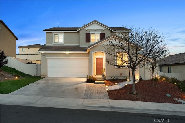 14226 Bonavento Ln, Beaumont, CA 92223 - traditional-style house featuring stucco siding, concrete driveway, and an attached garage