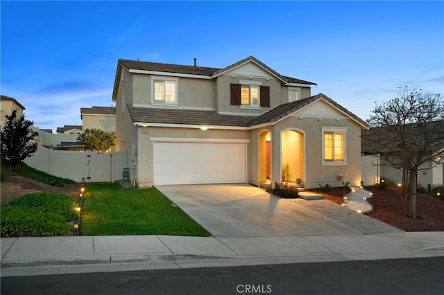 14226 Bonavento Ln, Beaumont, CA 92223 - traditional-style home with concrete driveway, a garage, stucco siding, a gate, and a tile roof