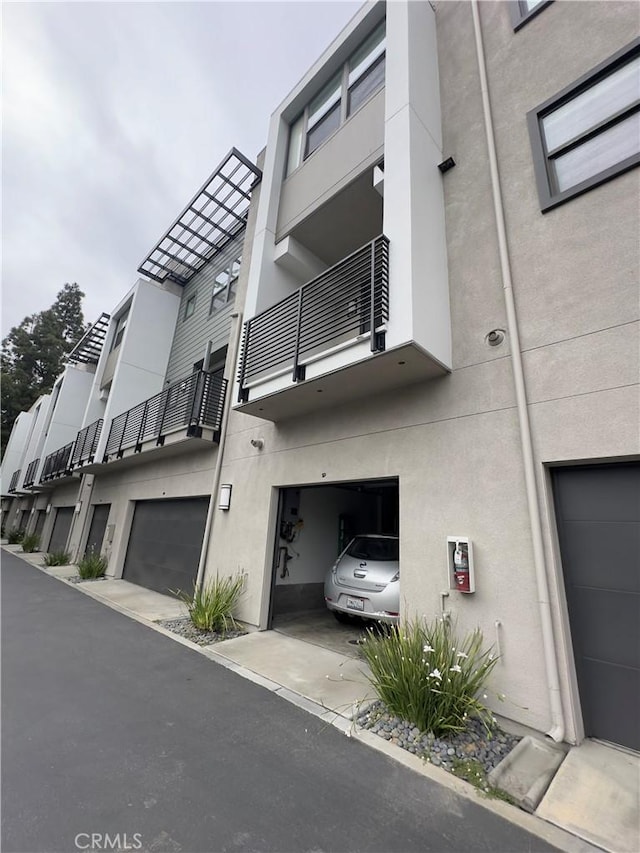 3945 Eagle Rock Blvd Unit 51, Los Angeles, CA 90065 - view of property with an attached garage
