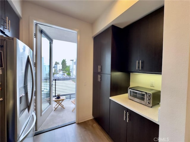 3945 Eagle Rock Blvd Unit 51, Los Angeles, CA 90065 - washroom with cabinet space and light wood-style floors