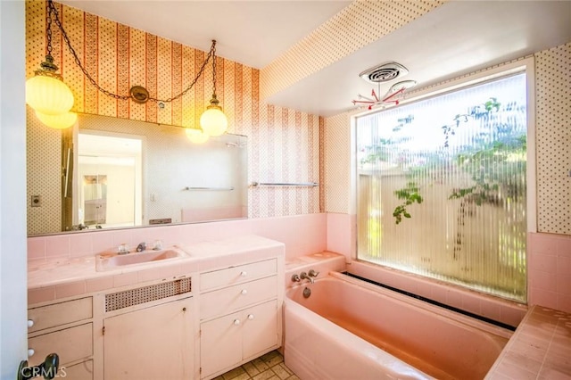2018 Calle De Los Alamos, San Clemente, CA 92672 - bathroom featuring wallpapered walls, a garden tub, and vanity