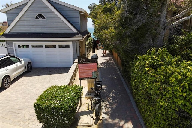 2018 Calle De Los Alamos, San Clemente, CA 92672 - view of home's exterior with decorative driveway and a garage
