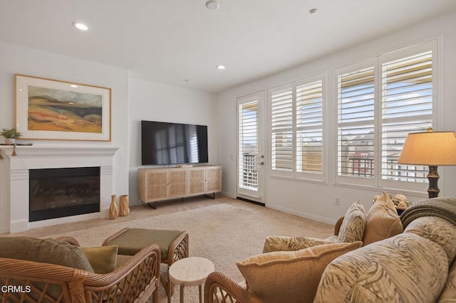 6287 Turnstone St Unit 4-304, Ventura, CA 93003 - living room featuring light carpet, a glass covered fireplace, and recessed lighting
