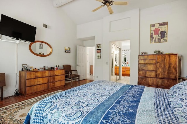 5015 Alicante Way, Oceanside, CA 92056 - bedroom featuring wood finished floors, high vaulted ceiling, beamed ceiling, connected bathroom, and a ceiling fan