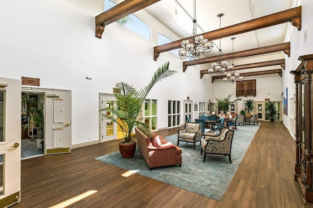 5015 Alicante Way, Oceanside, CA 92056 - living room with a chandelier, a towering ceiling, wood finished floors, and beamed ceiling