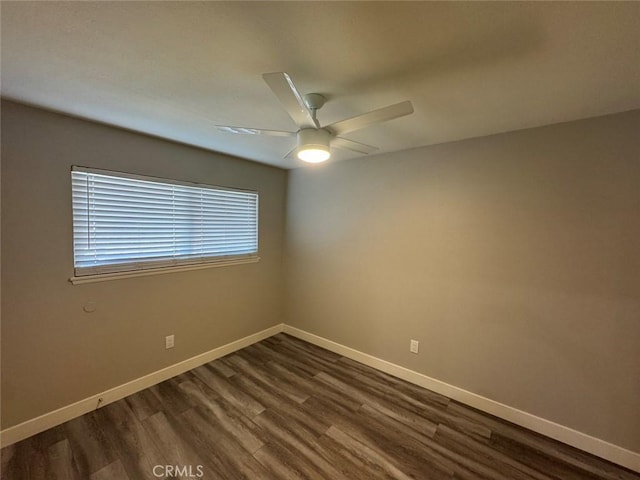 8667 Colorado Ave, Riverside, CA 92504 - unfurnished room featuring dark wood-type flooring, baseboards, and ceiling fan
