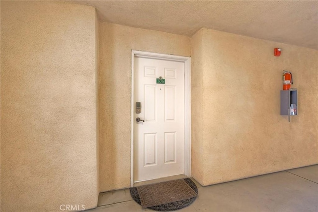 150 N River Cir Unit 306, Oceanside, CA 92057 - doorway to property featuring stucco siding