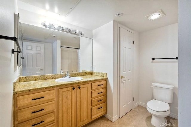 150 N River Cir Unit 306, Oceanside, CA 92057 - bathroom with vanity, toilet, tile patterned floors, and baseboards