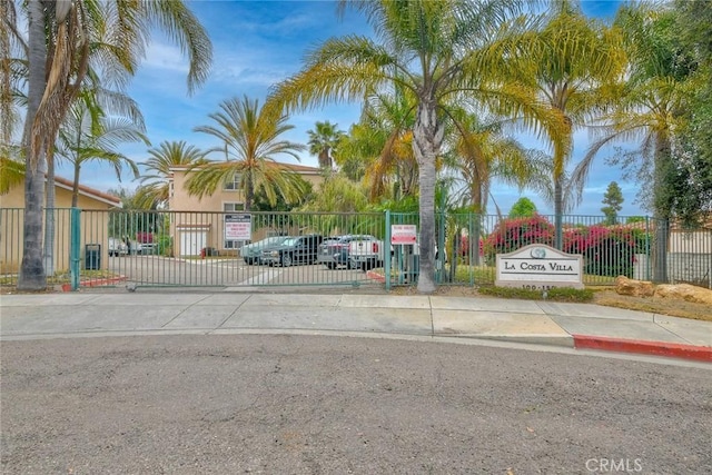 150 N River Cir Unit 306, Oceanside, CA 92057 - view of front of house featuring a gate and stucco siding
