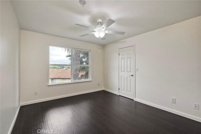 150 N River Cir Unit 306, Oceanside, CA 92057 - spare room featuring a ceiling fan, baseboards, and dark wood finished floors