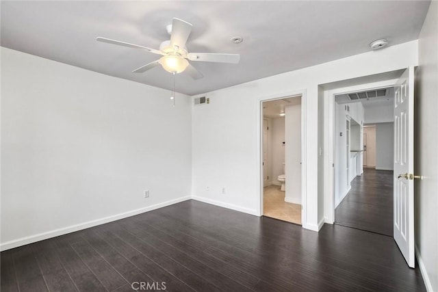 150 N River Cir Unit 306, Oceanside, CA 92057 - unfurnished bedroom with dark wood-type flooring, baseboards, a ceiling fan, and ensuite bathroom