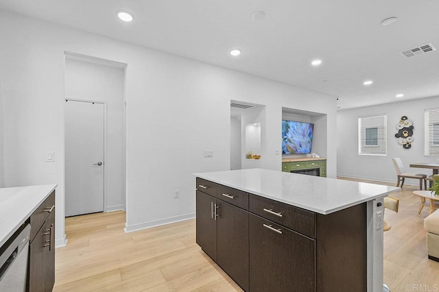 5480 Shorefront Dr # 166, San Diego, CA 92154 - kitchen featuring dishwasher, light wood-style flooring, light countertops, recessed lighting, and dark brown cabinets
