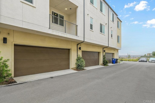 5480 Shorefront Dr # 166, San Diego, CA 92154 - view of property with an attached garage