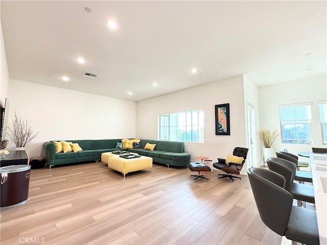 8896 Los Coyotes Ct Unit 410, Buena Park, CA 90621 - living room featuring plenty of natural light, light wood finished floors, and recessed lighting