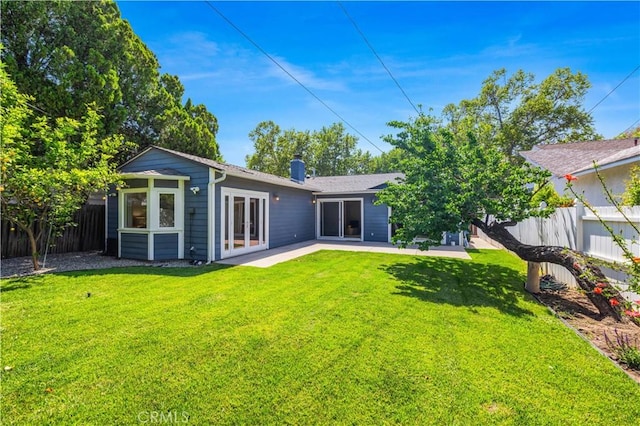 5112 Topanga Canyon Blvd, Woodland Hills, CA 91364 - rear view of property with a chimney, a patio, and french doors