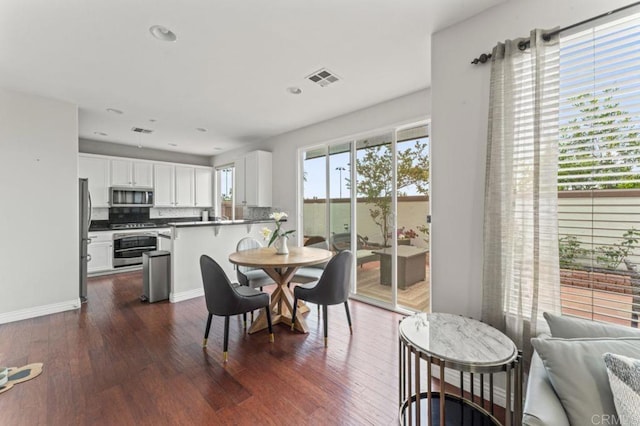 9925 Fieldthorn St, San Diego, CA 92127 - dining space featuring dark wood-type flooring and recessed lighting