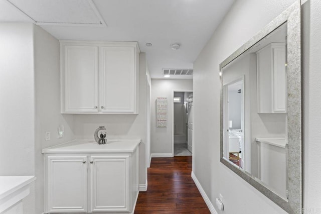 9925 Fieldthorn St, San Diego, CA 92127 - hallway with dark wood-type flooring and baseboards