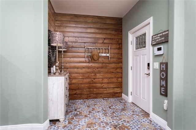 8390 Curbaril Ave, Atascadero, CA 93422 - entryway featuring log walls and baseboards