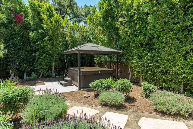 10503 Jimenez St, Sylmar, CA 91342 - view of yard featuring a hot tub, a gazebo, and a patio area