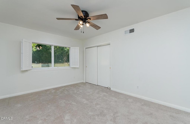 10503 Jimenez St, Sylmar, CA 91342 - unfurnished bedroom with carpet, a closet, baseboards, and a ceiling fan