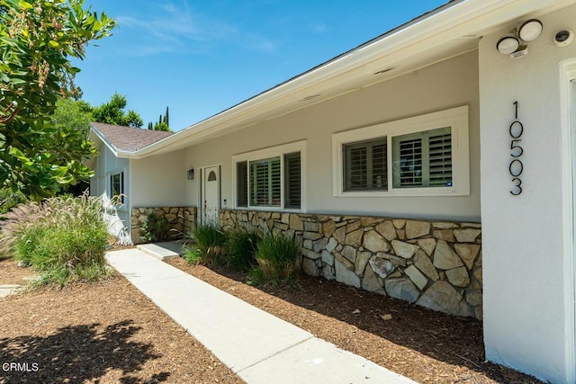 10503 Jimenez St, Sylmar, CA 91342 - property entrance featuring stone siding and stucco siding