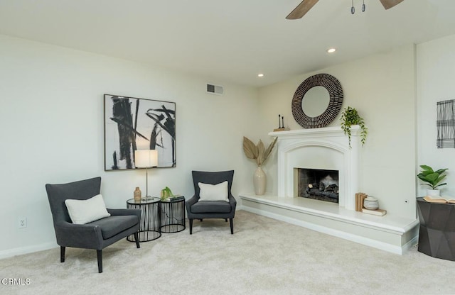 10503 Jimenez St, Sylmar, CA 91342 - sitting room with carpet, recessed lighting, a ceiling fan, a fireplace with raised hearth, and baseboards